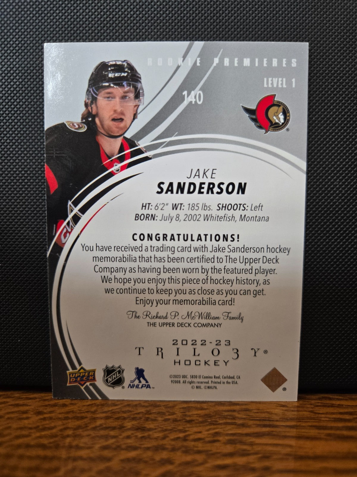 Upper Deck 2022-23 – Trilogy Rookie Premiers Jersey /499 – Jake Sanderson #140